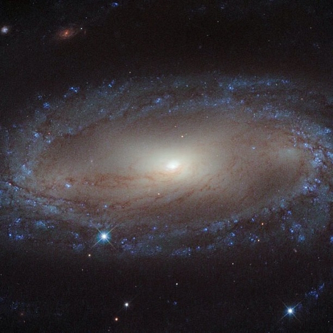 NASA’s Hubble space telescope catches a spiral lying more than 110 million light-years away from earth in the constellation of Antlia.