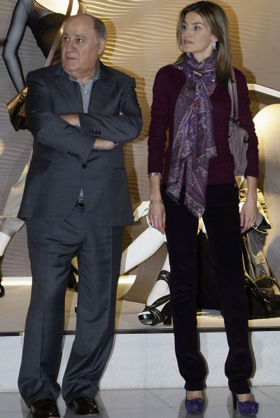 Spain's Princess Letizia (R) stands next to chairman of Spanish global fashion giant Inditex, Amancio Ortega
