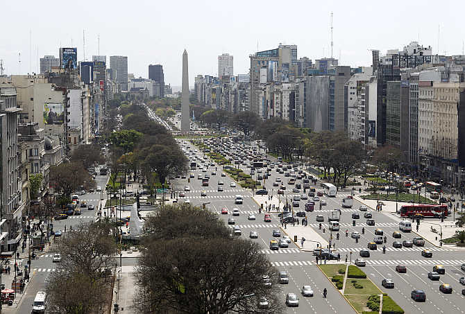 Buenos Aires' 9 de Julio Avenue with the Obelisk in the background, Argentina.
